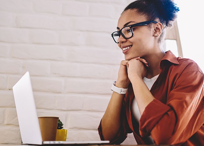 woman looking at laptop