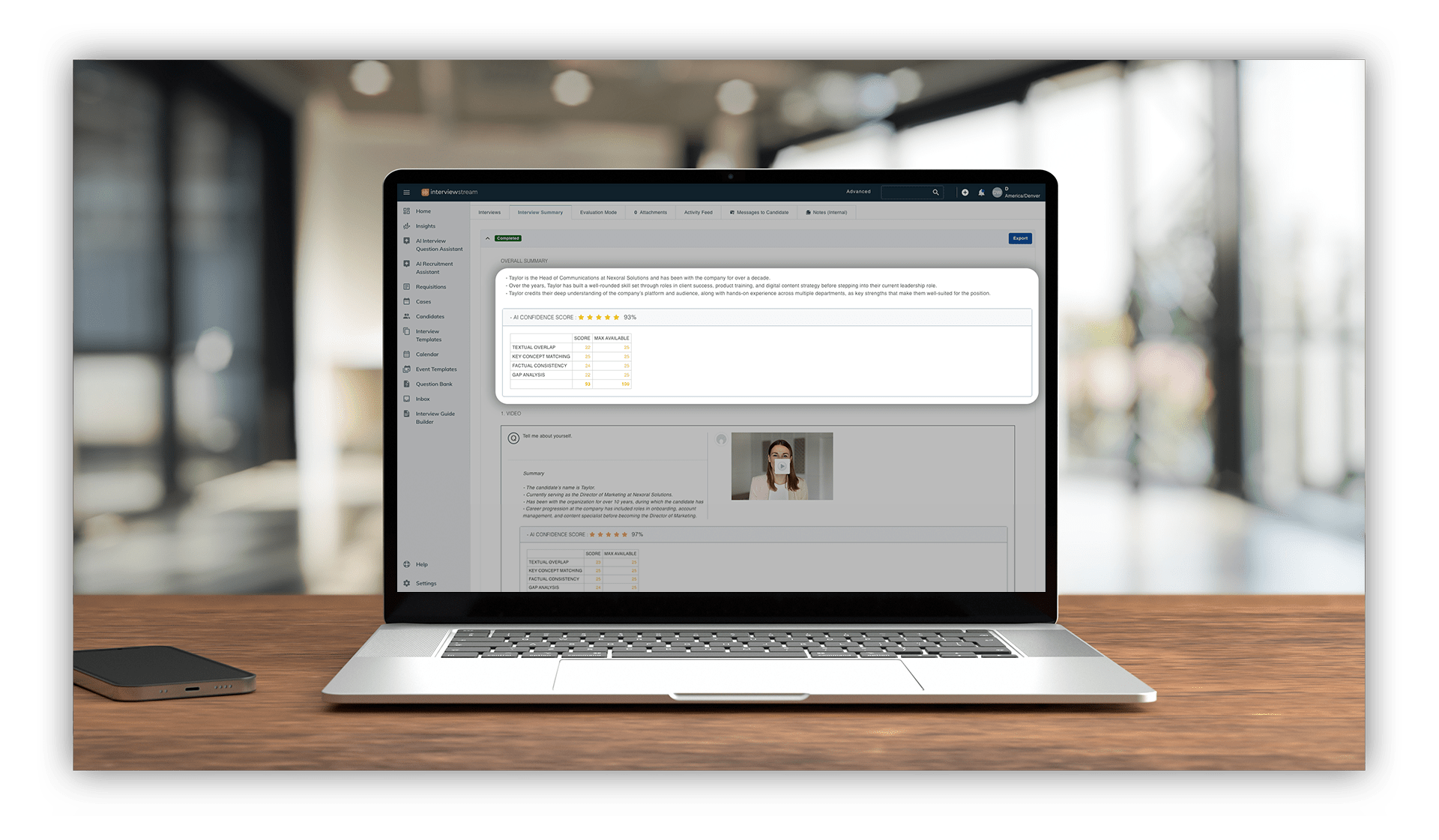 Laptop displaying interviewstream’s AI-generated interview summary with Confidence Score metrics including textual overlap, key concept match, and gap analysis.